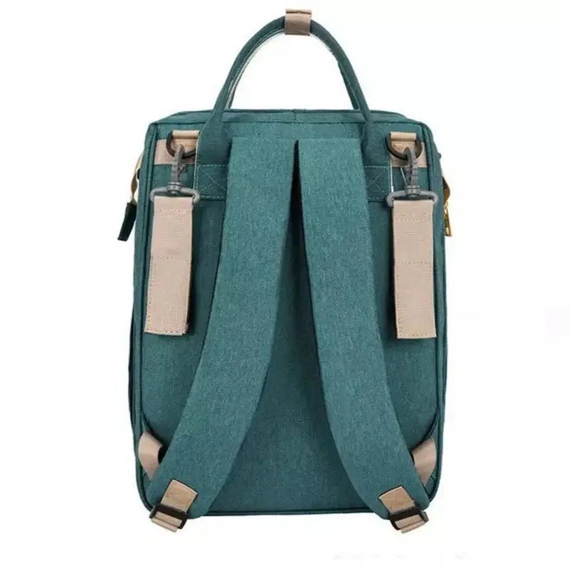 Sac à dos à langer lit teal avec bretelles beiges pour bébé et maman