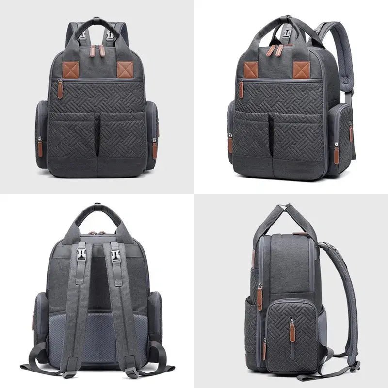 Sac à dos sac à langer gris foncé matelassé avec accents en cuir marron et poches multiple