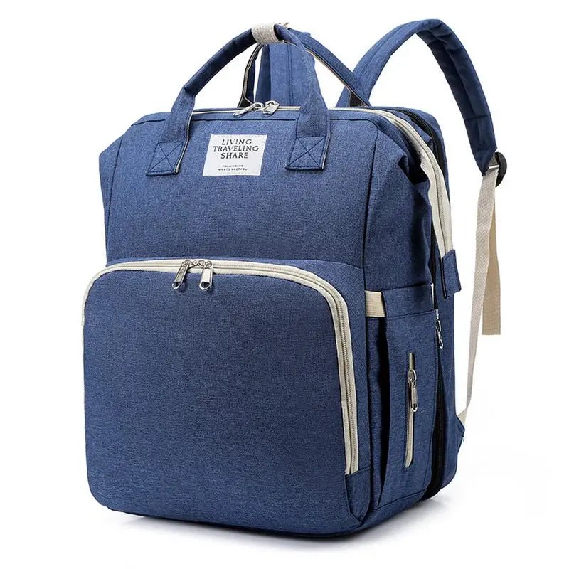 Sac à dos à langer USB en toile bleu marine avec plusieurs compartiments et poignée supérieure