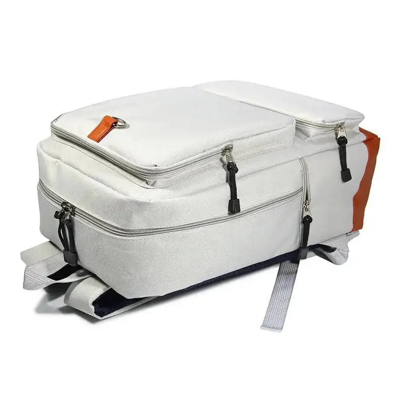 Sac à dos maternelle Dumbo blanc et orange avec compartiments zippés et bretelles ajustables