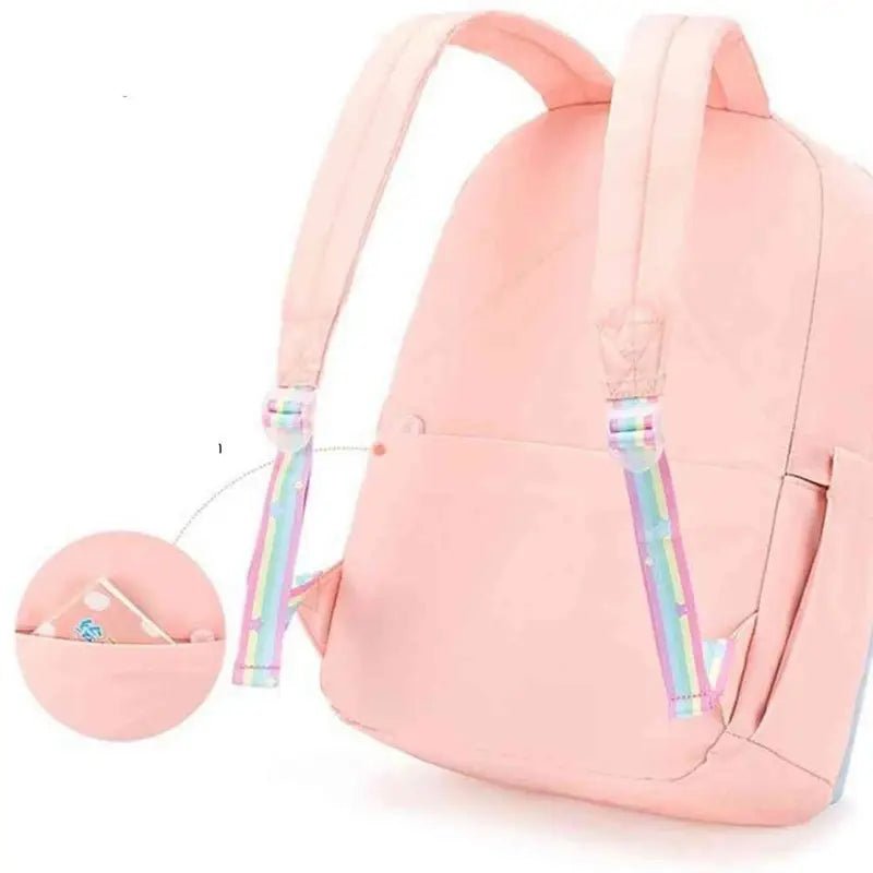 Sac à dos maternelle fille rose avec bretelles arc-en-ciel et poche secrète