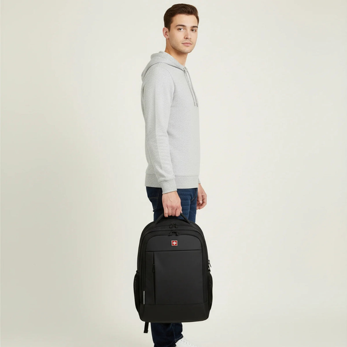 Sac à dos noir Xerion homme avec croix suisse rouge et multiples compartiments zipés