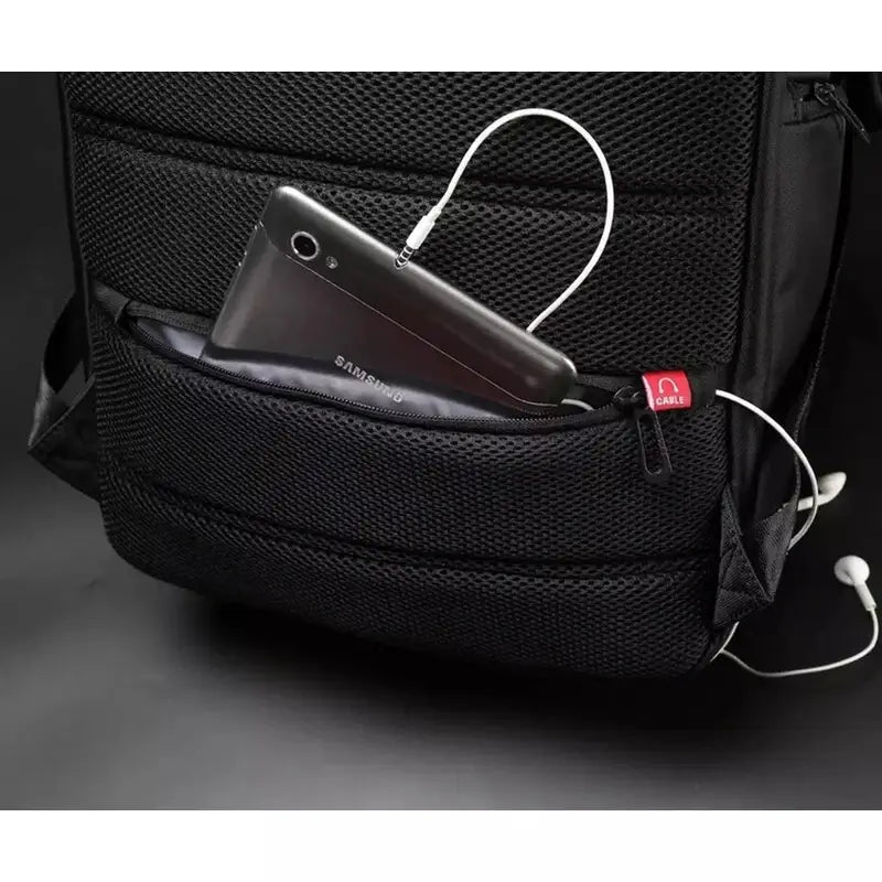 Sac à dos ordi femme noir avec poche dédiée pour téléphone et câble d’écouteurs