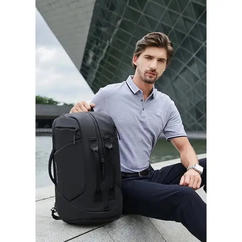 Sac à dos ordinateur professionnel noir avec plusieurs compartiments pour le voyage