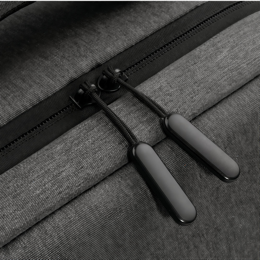 Fermeture éclair noire avec deux tirettes sur tissu gris du Sac à dos PC portable 17 pouces Urban Nova