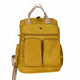 Sac à dos Perle Nacré jaune moutarde avec poches multiples et sangles ajustables