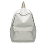 Sac à dos petite fille en tissu gris clair avec poche zippée et poches latérales