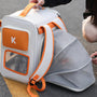Sac à dos pour chat portable ventilé avec porteur blanc et orange et extension en mesh