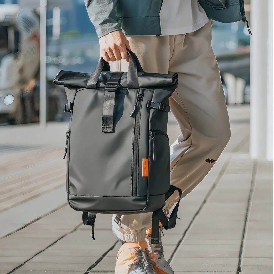 Sac à dos pour pc homme TangoColl 16 sombre gris avec accent orange et rabat roll-top