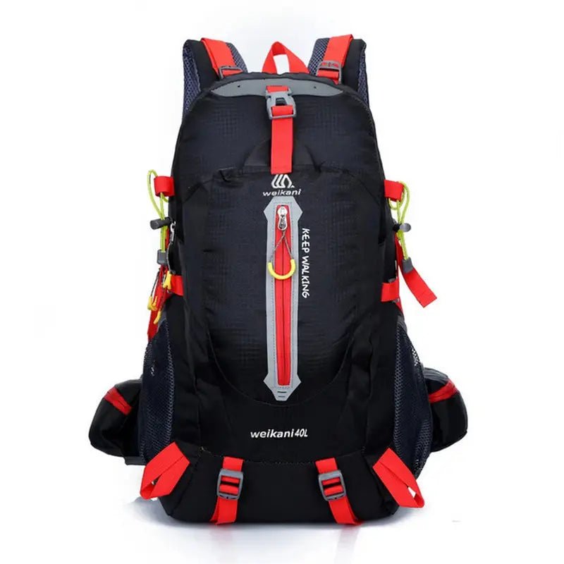 Sac à dos randonnée 30L noir et rouge avec plusieurs compartiments et bretelles ajustables