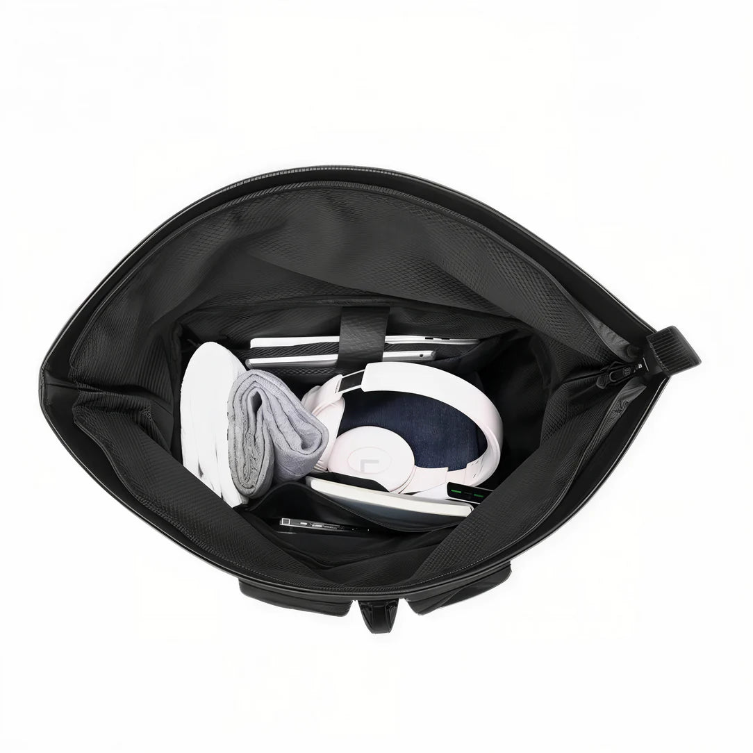 Sac à dos roll top de voyage RZTX noir avec électronique et vêtements à l’intérieur