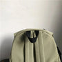 Sac à dos scolaire vert olive clair avec poignée supérieure noire