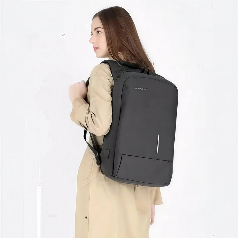 Sac à dos sécurisé LockPack gris foncé avec bande réfléchissante verticale à l’avant