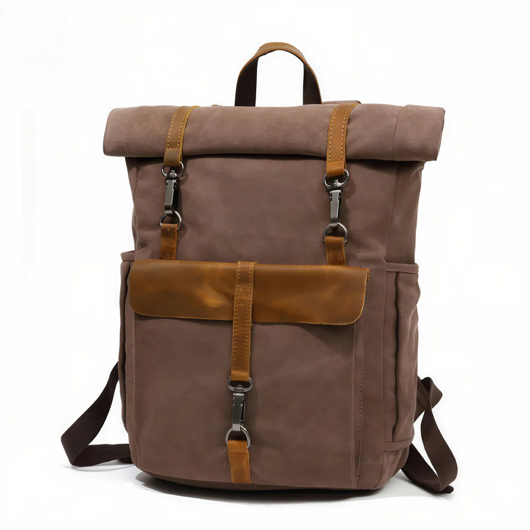 Sac à dos vintage en toile marron avec accents en cuir tan et fermoirs en métal