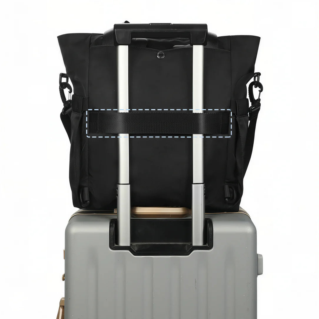 Sac à dos Tigernu Eclipse noir avec fermeture roulée, hardware argenté et bretelles ajustables