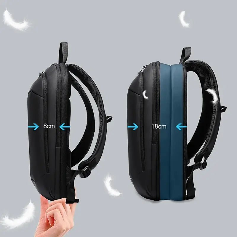 Sac à dos urbain femme imperméable noir avec compartiment principal extensible de 8cm à 18cm