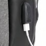 Sac à dos valise cabine en cuir noir avec câble de charge blanc Lightning