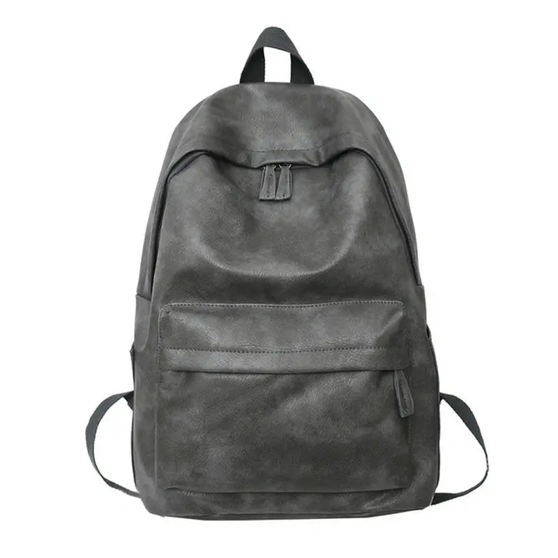 Sac à dos ville homme en cuir gris foncé avec poche zippée frontale et rabat supérieur