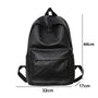 Sac à dos ville homme cuir en faux cuir noir avec poche frontale et compartiments zippés