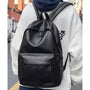 Sac à dos ville homme cuir en faux cuir noir avec poches avant et latérales