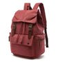 Sac à dos vintage homme en toile maroon avec bretelles en cuir synthétique et boucles