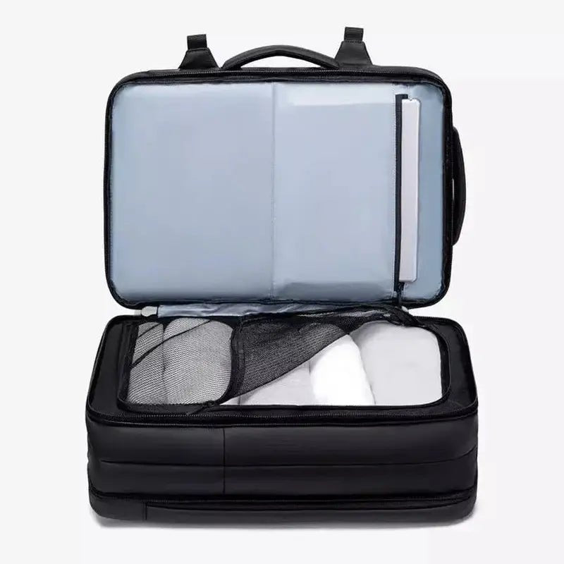 Sac à dos voyage avion noir ouvert avec compartiments pour ordinateur et vêtements
