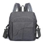 Sac à langer pour bébé en toile gris foncé avec plusieurs poches et bandoulières amovibles