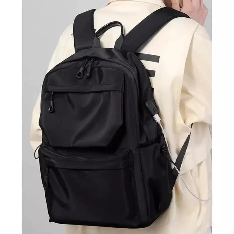 Sac de cours lycée homme avec sac à dos noir, multiples poches et port USB externe