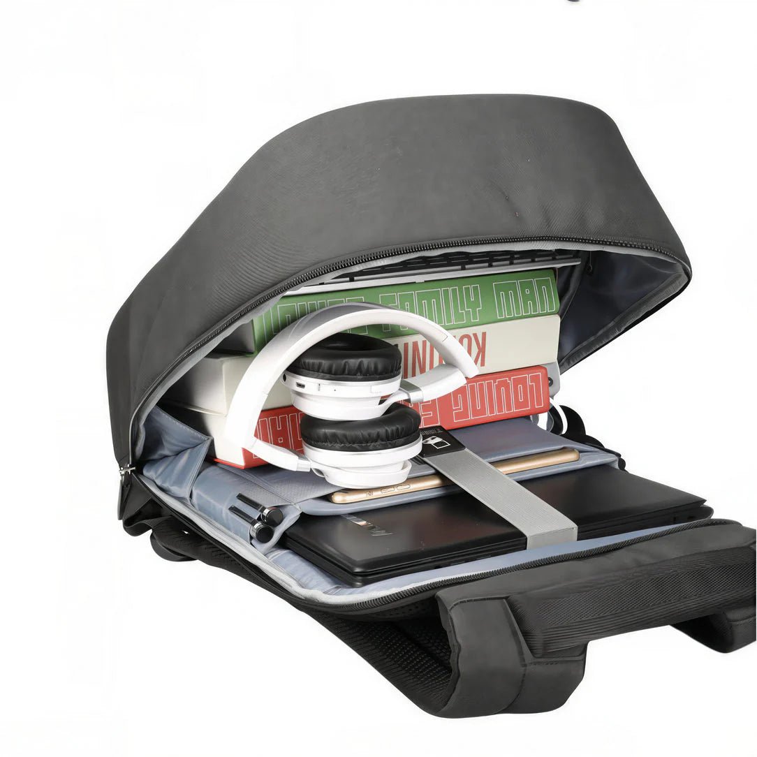 Sac de cours ordinateur Campus X ouvert avec ordinateur portable, casque, livres et tablette
