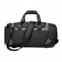 Sac de sport noir et gris avec sangle réglable, zip et reflets