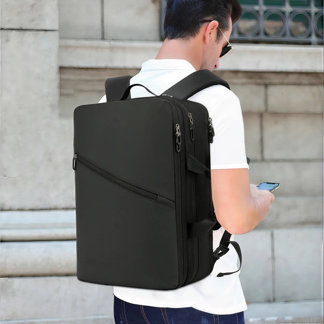 Sac de voyage format valise MoveCase I, sac à dos noir rectangulaire avec plusieurs poches zippées